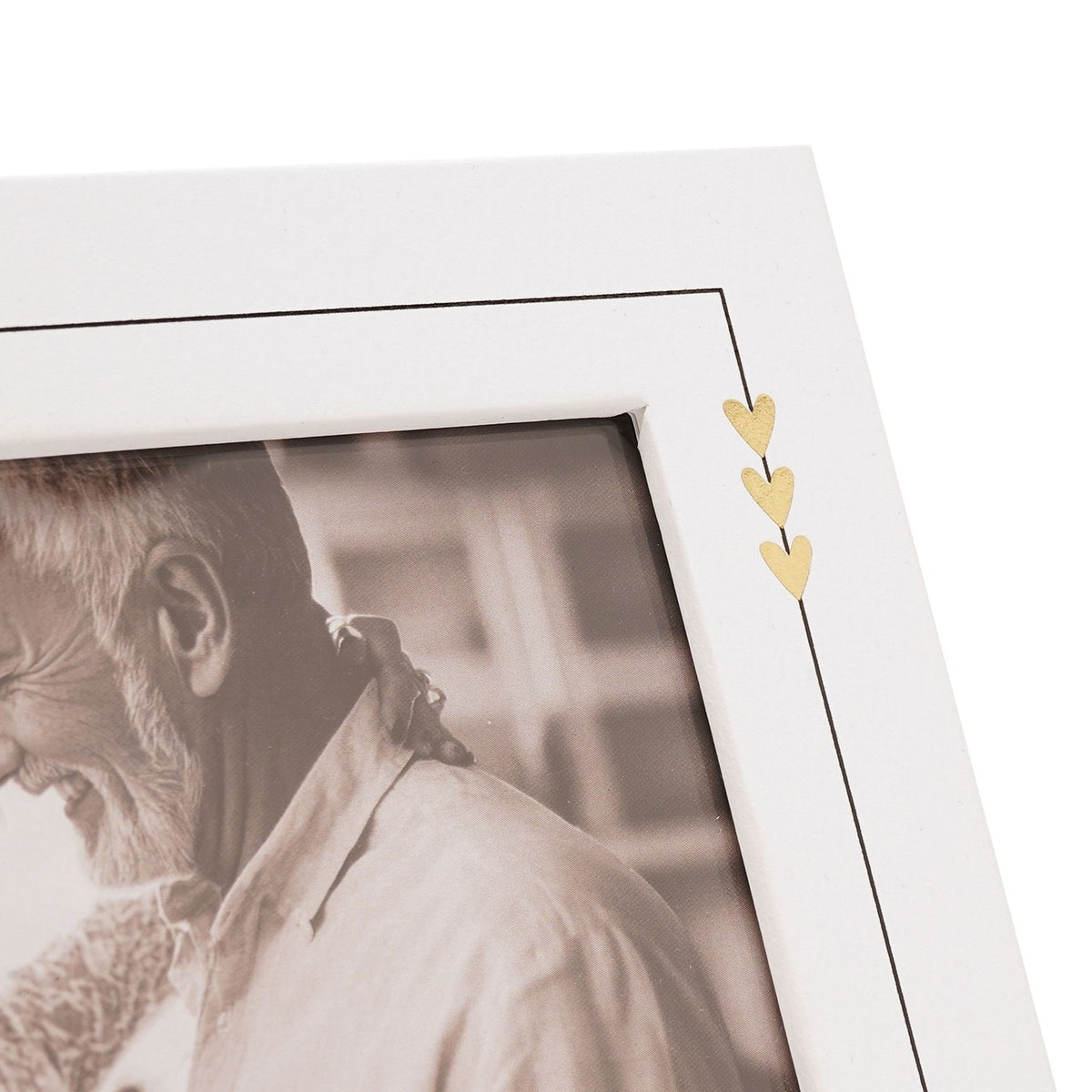 Close-up of the Golden Anniversary Square MDF Photo Frame in white, showing the black outline and three gold hearts in the corner, with a sepia photo inside.