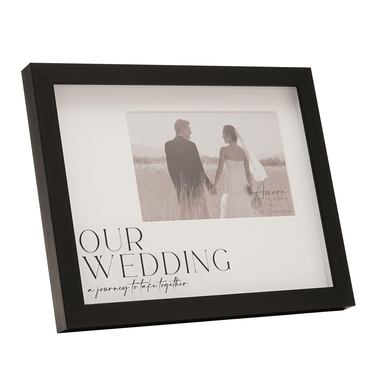 Black plastic easel photo frame with wide woodgrain-effect border, white mount printed "OUR WEDDING, a journey to take together", holding a 6 x 4in wedding photo.