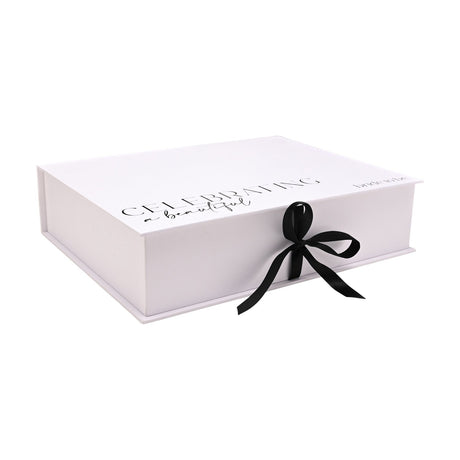 White rectangular A4 keepsake box with hinged lid printed "Celebrating a beautiful bride to be" in black script, tied with a black ribbon bow, on a plain white background.