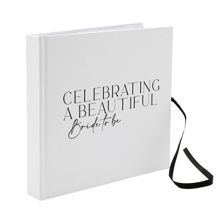 White textured photo album with "Celebrating a Beautiful Bride to be" printed on the cover and a black ribbon tie, shown on a plain background.