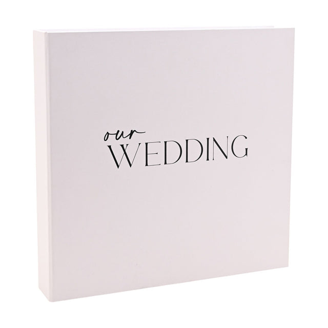 Square white "Our Wedding" photo album with matching box, featuring "our" in script and "WEDDING" in capitals on the front, shown against a plain background.