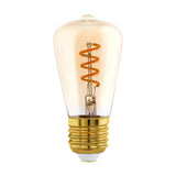 Amber dimmable LED bulb with spiral filament in a tapered vintage-style glass, brass-coloured E27 screw cap, 4W warm white, shown on a plain white background.