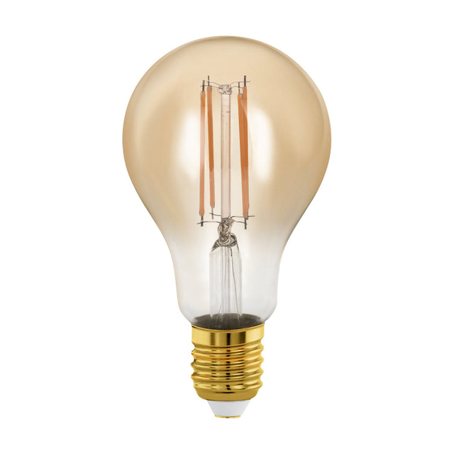 Amber LED bulb, A-shape, with four visible upright filaments in tinted glass and a brass-coloured E27 screw cap, shown on a plain white background.