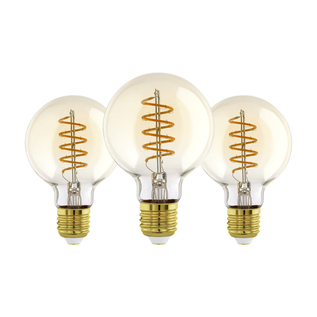 Set of three amber LED globe bulbs, G80 shape, with spiral filaments and brass-coloured E27 screw caps, shown on a plain white background.