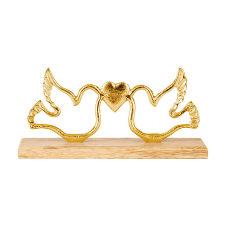 Amoatsy Bird Ornaments sculpture in gold aluminium, two open-outline doves with ridged wings facing a small heart, mounted on a natural mango wood base against a white background.