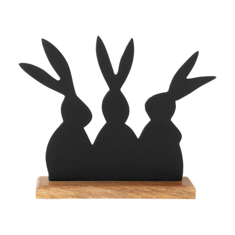 Amoatsy Rabbit Ornaments, a matt black aluminium silhouette of three rabbits with upright ears set into a natural mango wood base, shown on a plain white background.