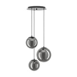 Anorias 3-light pendant with three smoked glass globes of varying sizes in a mirror-like black nickel finish, suspended from a round black ceiling canopy on a white background.