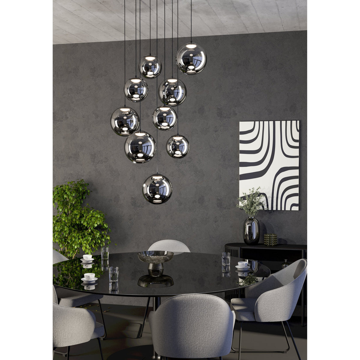 Anorias 9 Light Pendant with smoked glass globes of varying sizes cascading at different heights, black nickel canopy, shown above a dining table.
