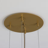 Oval gold ceiling canopy for the Ashford chandelier, showing multiple cable suspension points and a fabric-wrapped cord against a plain white ceiling.