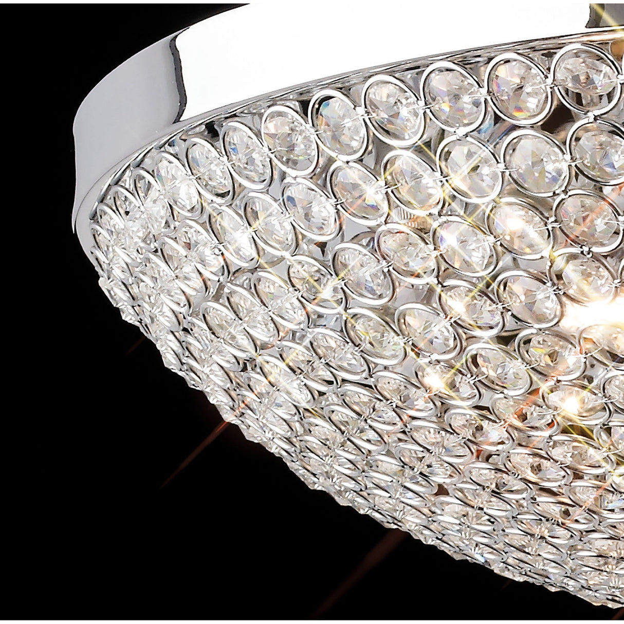 Close-up of the Diyas Ava 6 light crystal flush ceiling light showing the polished chrome frame and hemispherical dome of faceted clear crystals illuminated.