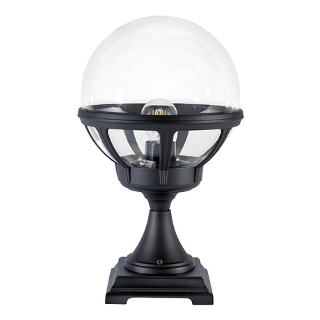 The Bologna 1 Light Pedestal - Black is a captivating outdoor lamp featuring a clear spherical glass cover and an LED bulb, expertly designed for globe-style lamp enthusiasts. It sits on a robust square base, bringing sophistication to any outdoor lighting setup.