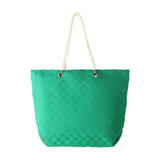 Bachuma Bag 56 x 18cm in bold green, a woven tote with checkerboard texture, cream braided rope handles through metal eyelets, shown on a plain white background.