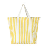 Bachuma Bag in bold yellow and white stripes, a fabric tote with cream webbing handles and a top zip closure, shown on a plain white background.