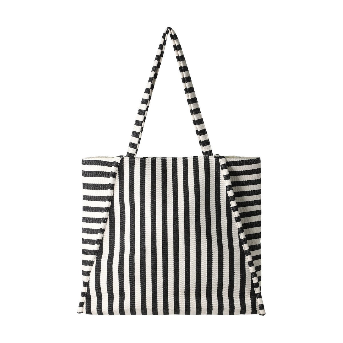 Bachuma Striped Bag in black and cream woven fabric, with vertical front stripes, horizontal side panels, two shoulder straps, and a snap-top closure, shown on a plain white background.