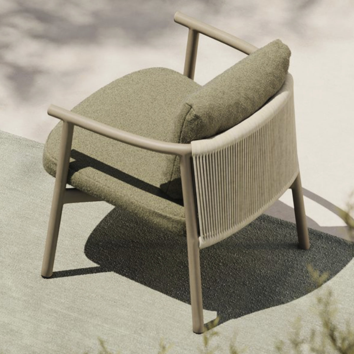 Balm Aluminium Garden Lounge Chair with beige frame, curved back rail, splayed legs, woven rope sides, and olive green seat and back cushions, shown outdoors from above.