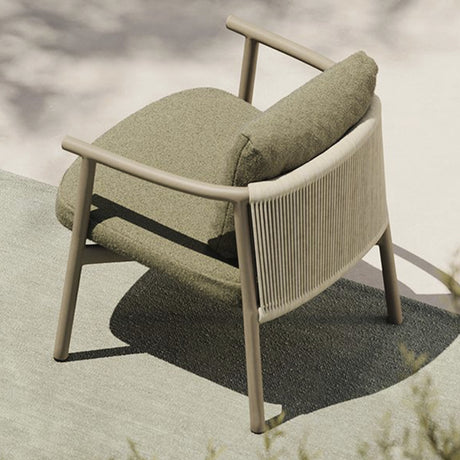 Balm Aluminium Garden Lounge Chair with beige frame, curved back rail, splayed legs, woven rope sides, and olive green seat and back cushions, shown outdoors from above.