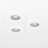Barranco Downlight set of three round recessed GU10 downlights in white plastic, 9cm flush ceiling fittings with tiltable lamp heads, shown on a plain white background.