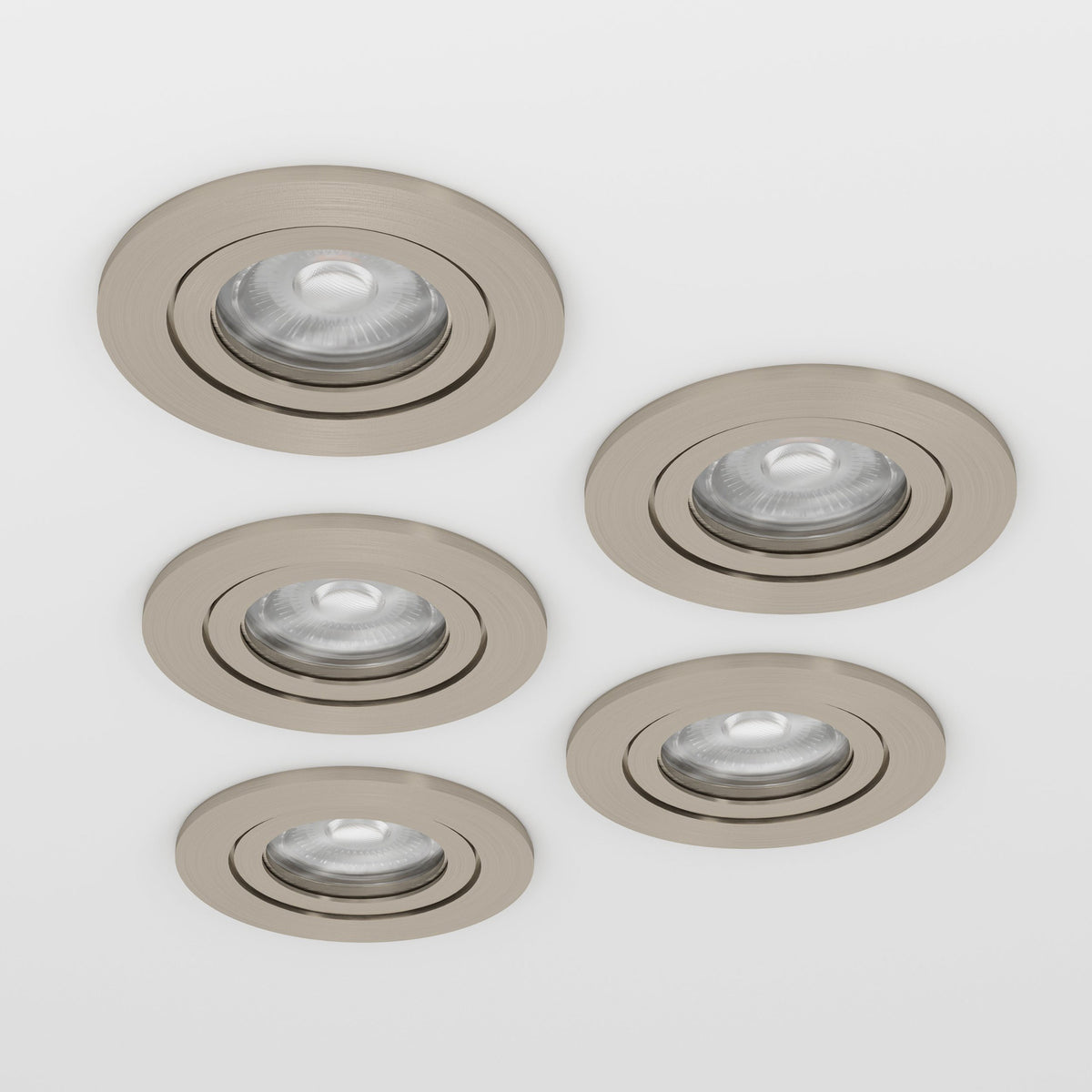 Set of five round LED downlights in satin nickel with brushed trim rings and integrated lenses, shown against a plain light background.