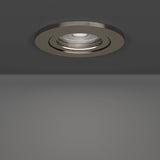Round LED downlight from the Barranco set of 5, satin nickel finish with tiltable trim and integrated LED, recessed in a grey ceiling.