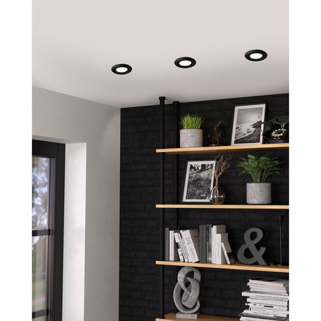 Baselle Downlight Set of 3 in black, three round recessed steel downlights fitted flush into a white ceiling above a black-panelled shelving display.
