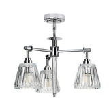 The Agatha 3 Light Pendant - Polished Chrome exudes elegance with its clear, fluted glass shades. This contemporary design includes a central rod and angular arms, each holding a bulb encased in a cone-shaped glass shade for a refined and sophisticated appearance.