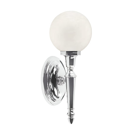 The Dryden-3 Wall Light - Polished Chrome features a contemporary design with a round, frosted glass globe light resting on a polished chrome-finished metal base, attached to a circular mount. Its minimalistic elegance fits seamlessly into modern interiors and is designed to accommodate an LED G9 lamp for improved efficiency.