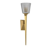The Verity 1 Light Wall Light in brushed brass features a gold-colored arm and base, accentuated by a cut glass shade resembling a torch.