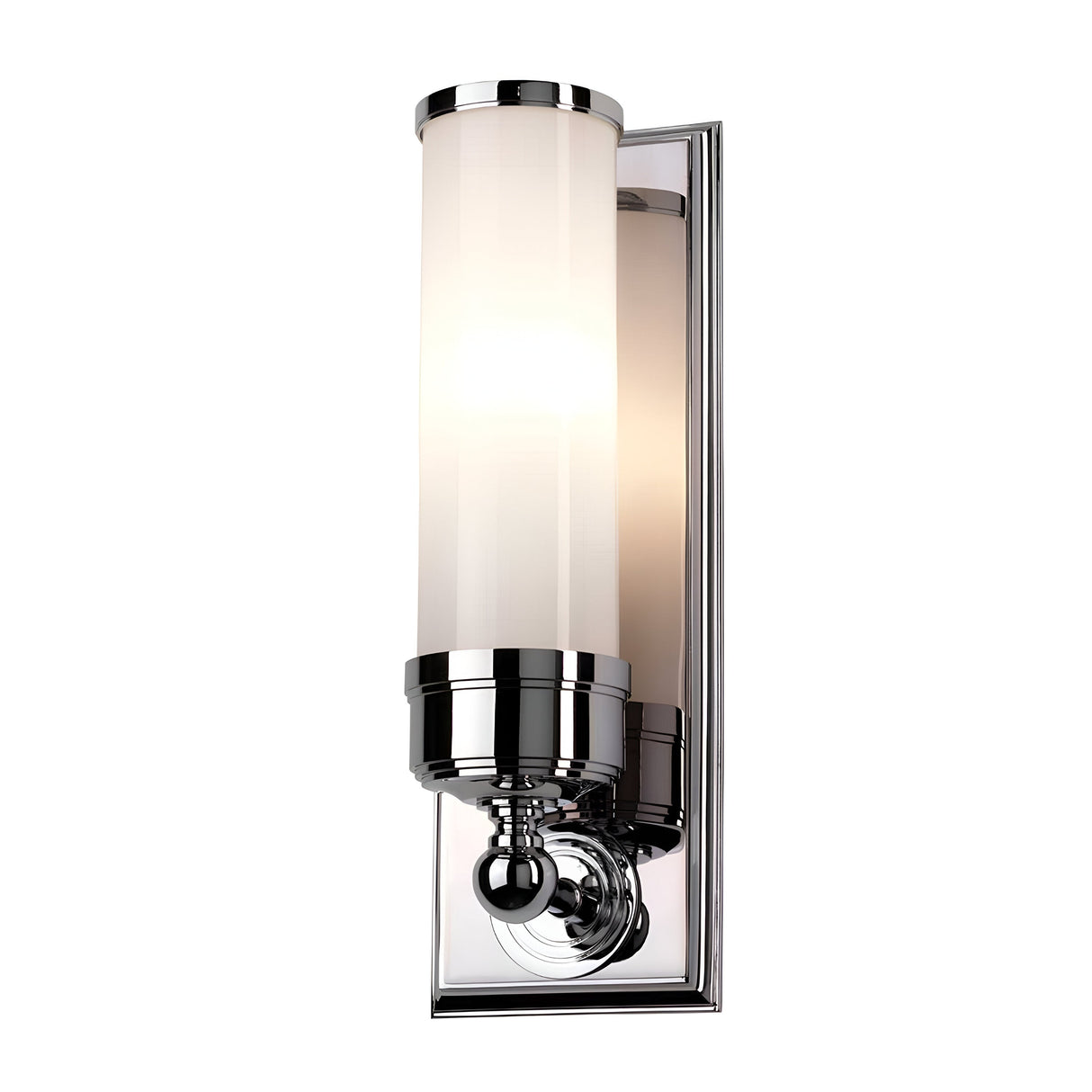 The Worcester 1 Light Wall Light in polished chrome features a cylindrical frosted glass shade that emits a soft, warm glow. With its sleek design, it embodies a modern yet transitional elegance, making it perfect for contemporary interiors.