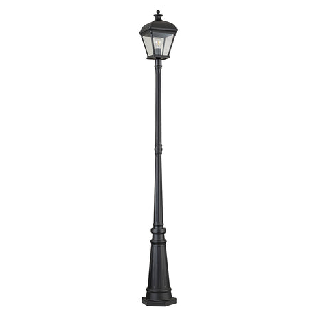 The Bayview 1 Light Lamp Post in black showcases a vintage-style with a classic lantern design, featuring a tall and slender profile. Its glass enclosure for the bulb and decorative base make it ideal for outdoor lighting.