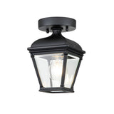 The Bayview 1 Light Outdoor Porch Ceiling Light in black boasts an elegant design with a classic lantern style, featuring clear glass panels that beautifully highlight the visible light bulb within.