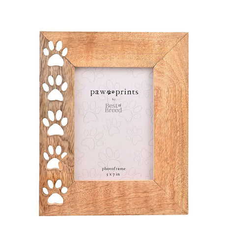 Rectangular mango wood photo frame in natural light brown finish, with five paw prints cut through the left border, holding a 5x7 in portrait photo on a plain white background.
