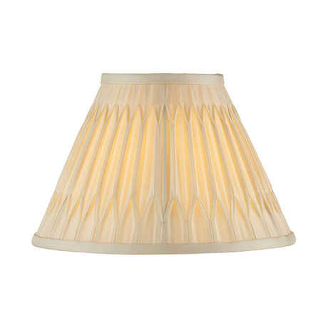 Endon Bevdon 25cm tapered lamp shade in ivory silk with hand-stitched double pinch pleats and taped edges, shown on a plain white background.