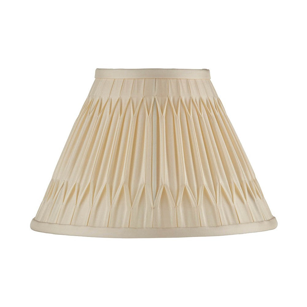 Endon Bevdon 25cm tapered lamp shade in ivory silk with hand-stitched double pinch pleats and taped edges, shown on a plain white background.