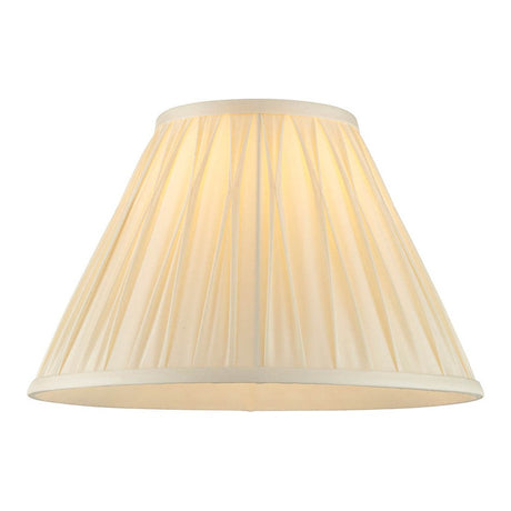 Endon Bevdon 30cm tapered lamp shade in ivory silk with hand-stitched pinch pleats and box pleat design, shown against a plain white background.