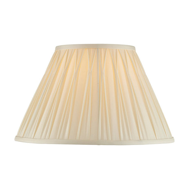 Bevdon 35cm tapered lamp shade in ivory silk with box pleat design and hand-stitched pinch pleats, shown on a plain white background.