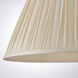 Endon Bevdon 40cm tapered lamp shade in ivory silk with hand-stitched pinch pleats and cream lining, shown close-up against a plain light background.