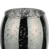 Close-up of the Bezamby glass tealight holder in grey, showing its barrel shape, wide rim, and mirrored mercury-glass finish with silver speckles.