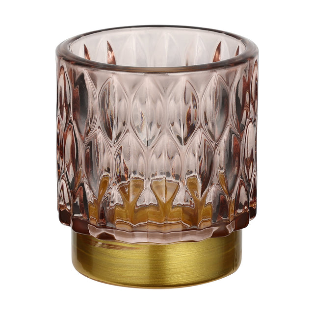 Bezamby glass tealight holder in dusky pink with raised almond-shaped facets and a gold-coloured metal base, shown on a plain white background.
