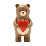 Bear Hugs Standing Resin Decoration, 8cm brown bear figurine holding a glossy red heart, with cream muzzle and belly, rosy cheeks, on a plain white background.