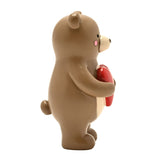 Bear Hugs Standing Resin Decoration with Heart 8cm in Brown, side view showing a standing bear with cream muzzle, rounded ears and tail, holding a glossy red heart, on a plain white background.