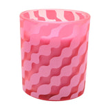 Dream Big Wavy Stripe Round Scented Candle in pink glass with diagonal wavy stripe pattern, visible wick, on a plain white background.