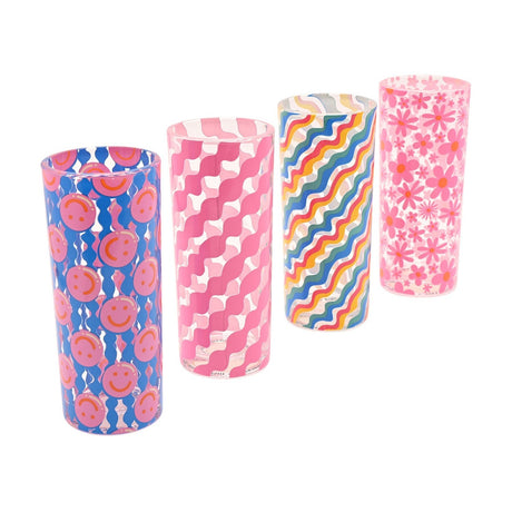 Set of 4 tall glass tumblers, 290ml, with pink smiley faces on blue stripes, pink wavy stripes, multicoloured diagonal waves, and pink daisy patterns, on a plain white background.