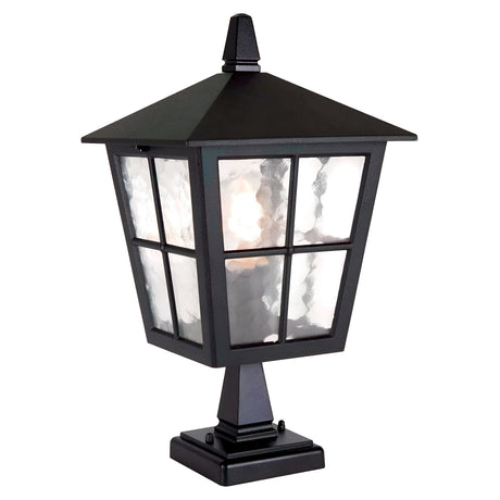 The Canterbury Outdoor Pedestal Lantern - Black showcases its British design with a stylish black frame and pointed top. With four frosted glass panels divided into sections, this lantern offers a classic, elegant appearance. Its durable construction ensures it stands out against a plain white backdrop.