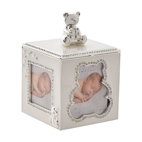 Square silverplated metal trinket box with a teddy bear figure on the lid, featuring two crystal-edged photo windows holding baby portraits, shown on a white background.