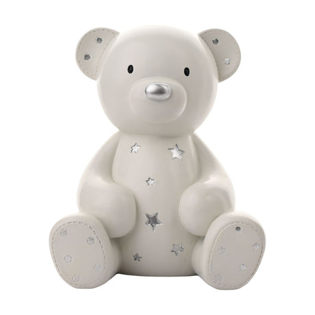 Large Teddy Bear Resin Money Box, white with silver stars on its tummy and silver-dotted ears and feet, seated with legs outstretched, on a plain white background.