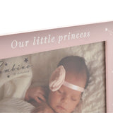 Close-up of the pink MDF rectangular photo frame's top edge, reading "Our little princess" above a sleeping baby photo with a star motif in the corner.
