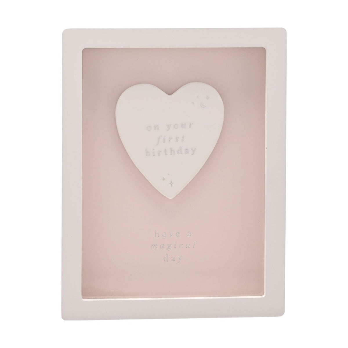 1st Birthday Heart Framed Wooden Plaque in white and pink, featuring a raised white heart reading "on your first birthday" with "have a magical day" below, on a plain background.