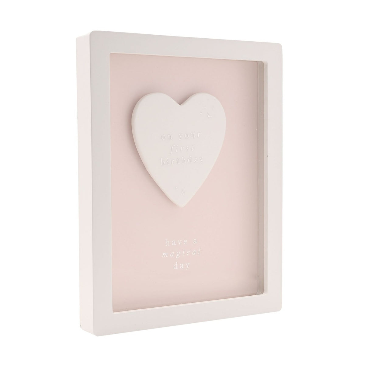 1st Birthday Heart Framed Wooden Plaque, 17cm, with raised white heart on pink panel reading "on your first birthday" and "have a magical day", white frame, plain background.