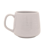 Grey porcelain mug from the Mummy and Daddy set, with "making memories, one hug at a time" in silver script and stars and crescent moon detail, shown on a plain background.