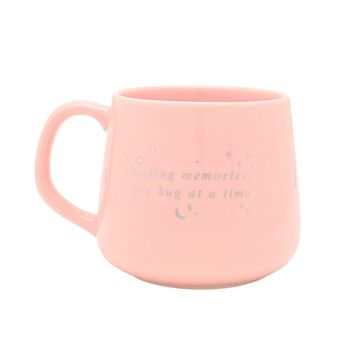 Pink porcelain mug from the Mummy and Daddy set, with handle and silver script reading making memories, one hug at a time, surrounded by stars and a crescent moon.